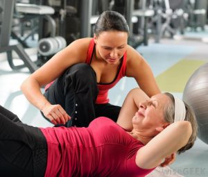 Older woman doing pushups 300x255