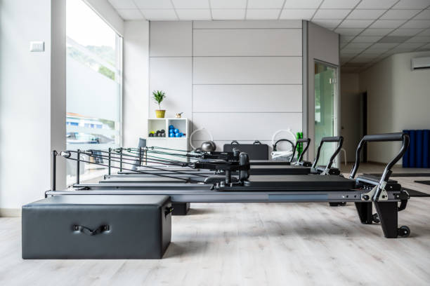Pilates studio gym with mats, reformers and Pilates arcs